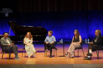 Norman and the FTLH team sit on stage